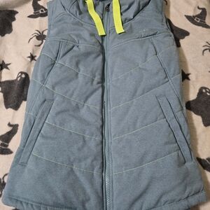 The North Face Blue Vest with Yellow Accents